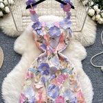 Floral dress with a hanger on a textured surface