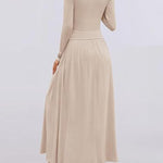 Beige long-sleeve dress on a plain background